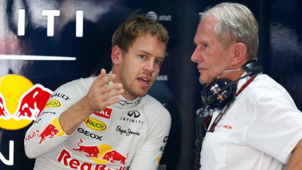Sebastian Vettel talking to Helmut Marko. India October 2013.