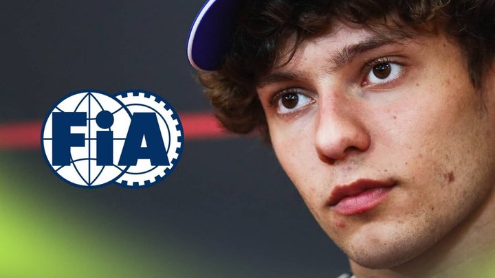 A close-up shot of Kimi Antonelli in a press conference with a prominent FIA logo alongside him