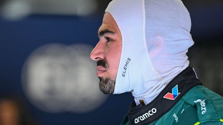 Lance Stroll wearing his fireproofs, head turned to the side