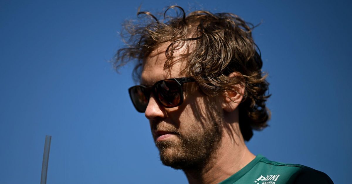 Sebastian Vettel heads through the paddock. Melbourne April 2022.