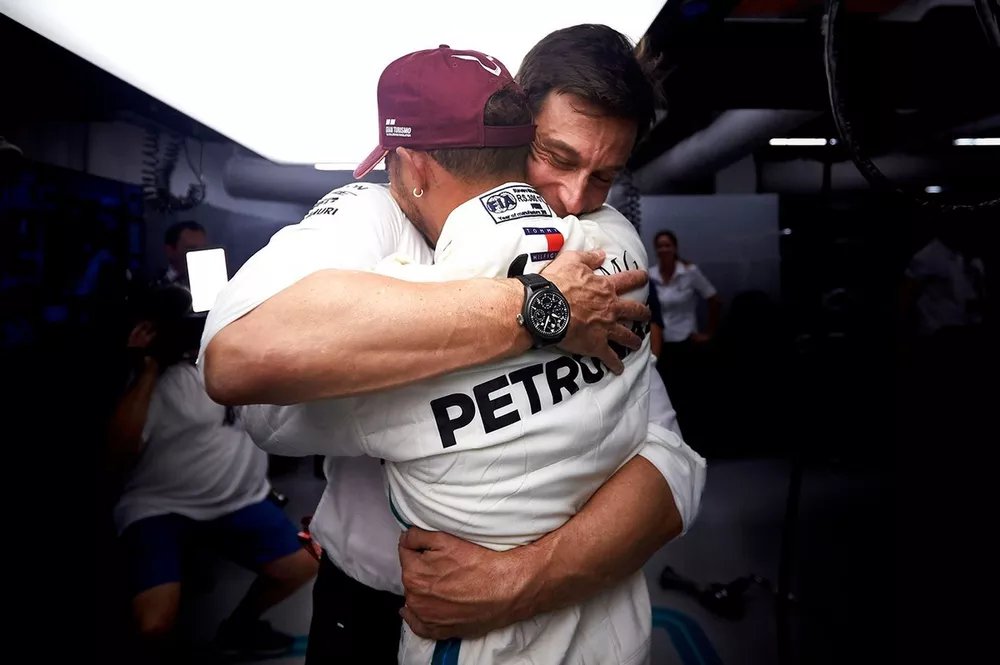 Toto Wolff, Executive Director (Business), Mercedes AMG, and Lewis Hamilton, Mercedes AMG F1, celebrate pole